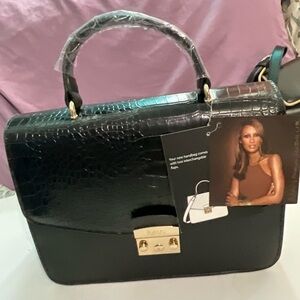 Brand new IMAN black purse